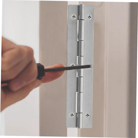 Stainless steel piano hinge installed on cabinet door frame with screws