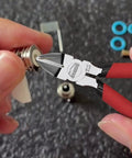 Close-up of Must Have Two Piece Wire Cutters Set With 5 Inch Micro Flush Cutter in use on electronics component