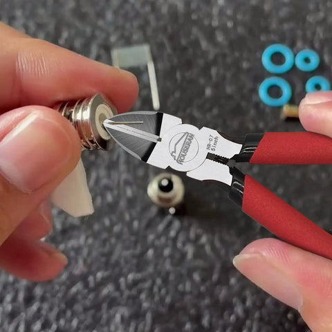 Close-up of Must Have Two Piece Wire Cutters Set With 5 Inch Micro Flush Cutter in use on electronics component
