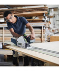 Cordless Circular Saw Packs Serious Punch With 18V To 36V Dual Voltage Switch And Included 5.2 Ah Battery cutting through a wood panel.