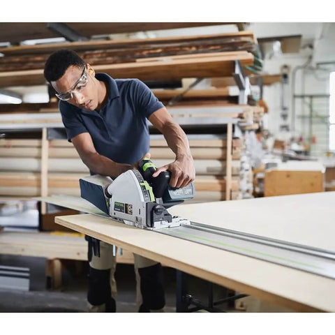 Cordless Circular Saw Packs Serious Punch With 18V To 36V Dual Voltage Switch And Included 5.2 Ah Battery cutting through a wood panel.