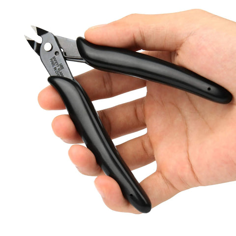 Side view of BOENFU 5-inch black-handled flush-cut wire cutter held in hand
