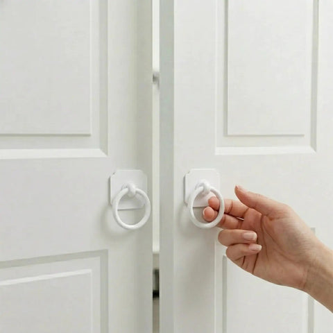 Large White Ring Bi-Fold Closet Door Pulls With Protective Base 1-3/5 Inch, 4 Pack being installed on bifold doors