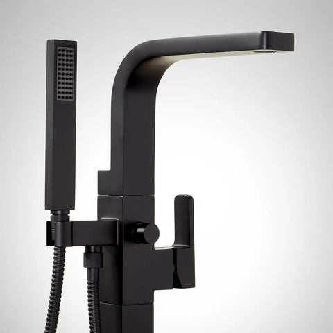 Hibiscus Straight Up Modern Freestanding Tub Faucet Forged From Solid Brass Featuring Integrated Hand Shower On Flex Hose, close-up view.