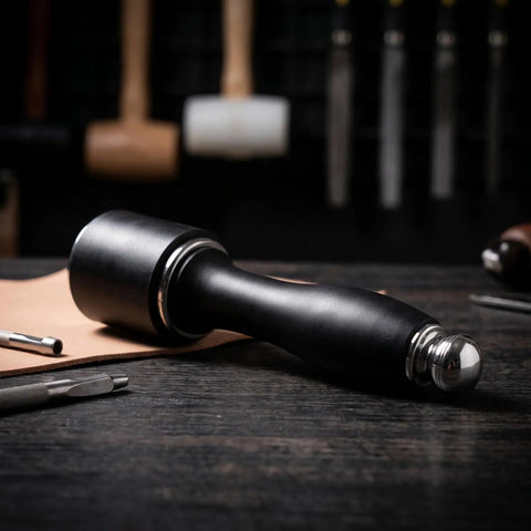 Tough As Nails Nylon Carving Hammer For Leather Tooling And Die Stamping Go To Mallet With Locked Grip solid face on wooden table.
