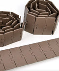 Rock Solid One Meter Flat Top Conveyor Chain With 38.1mm Pitch And 152.4mm Width Single Hinge Direct Drive Transmission For Beverage Lines Built Legit With Hella Durable Pom Resin For Smooth Operation, brown flexible interlocking chain.