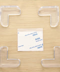Peel and stick corner protectors for furniture, 30 pack PVC edge guards shown with adhesive on wooden surface