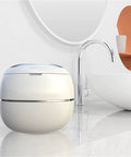 Sleek Ultrasonic Cleaner Kicks Deep Grime From Retainers Mouth Guards And Braces With Dual Modes displayed on a clean countertop.