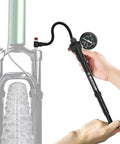 Using the Beast Mode High Pressure Bike Shock Pump With Gauge For Front Forks, Rear Shocks And Tires, 300 PSI Max on a bike fork