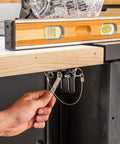 Adjusting Knock Down Outfeed Table Kit with Foldable Legs for Small Shops featuring level setup on table saw