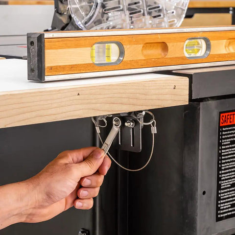 Adjusting Knock Down Outfeed Table Kit with Foldable Legs for Small Shops featuring level setup on table saw