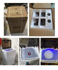 Supercompact Portable Washer And Dryer Combo unboxed showing compact design, top view with blue light and operating controls.