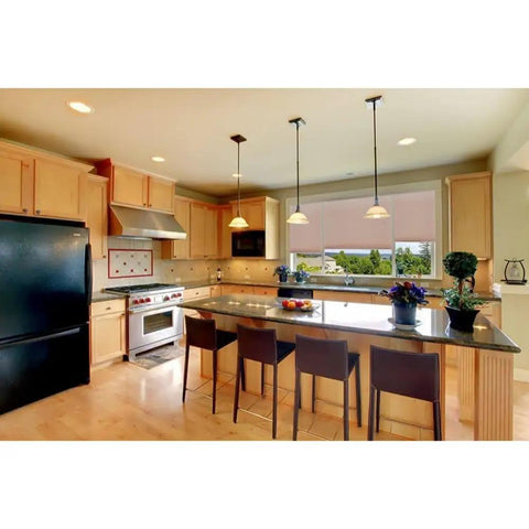 Kitchen with No Tools Needed Easy Lift Cordless Pleated Light Filtering Window Shade installed in window, warm tone decor.