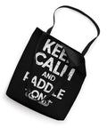 Top view of black Dragon Boat Racing Paddler Tote Bag For Dragonboating Enthusiasts Keep Calm And Paddle On Gear with bold white text.