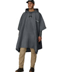 Person wearing Ultra Lite 2 Reusable Waterproof Breathable Poncho For Rain Gear That Actually Works Lightweight Durable Nonwoven Polypropylene