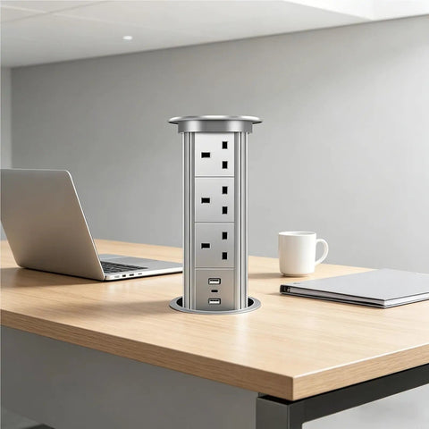 Auto Rises Pop Up Outlet Slick Aluminum Desk Power Strip With Swappable Modules Quick Charge Ports And Optional Speaker on office desk