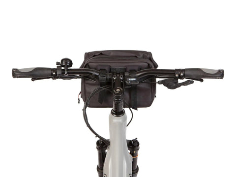 Front view of Alpha Handlebar Bag 6 Liter for City Commutes and Bike Tours, Weatherproof Messenger With Roll Top And Tech Pocket, Black.