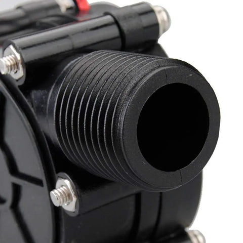 Close-up of 12V Micro Water Turbine Generator with G 1/2 inch male thread focused on outlet for off-grid charging