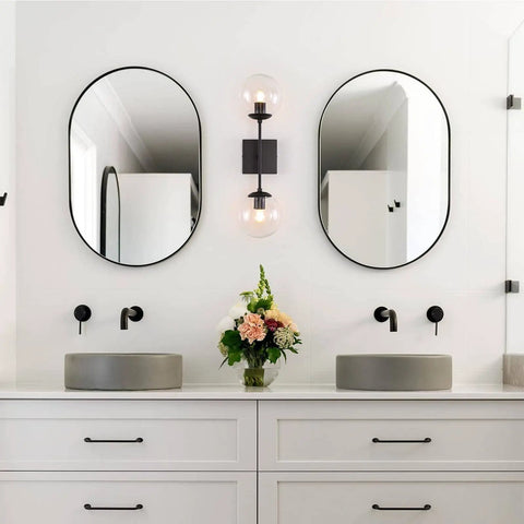 Bathroom with Black Double Wall Sconce Vanity Light With Two White Glass Globes Mid Century Modern Globe Lighting, matte black fixture.