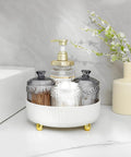 360 Degree Rotating Makeup And Skincare Organizer Tray Lazy Susan on bathroom countertop with jars and pump bottles