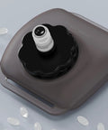 Top view of Hands Free Hydration Wrist Bottle For Runners, 200ml Silicone Leak Proof Water Bottle showing cap and valve details.