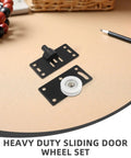 8 Pairs Black Carbon Steel Sliding Door Wheels For Closets And Wardrobes Rock Solid Heavy Duty Cabinet Pulleys Built Damn Tough With Smooth Gliding Performance Runs Like A Dream Daily, includes black sliding wheel set on a beige surface.