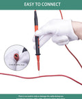 Hand holding Back Probe Pins Kit 8Pcs Pro Grade Ultra Thin 0.7mm Pins for Automotive Instrument Testing 2mm Socket Banana Jack Leads.