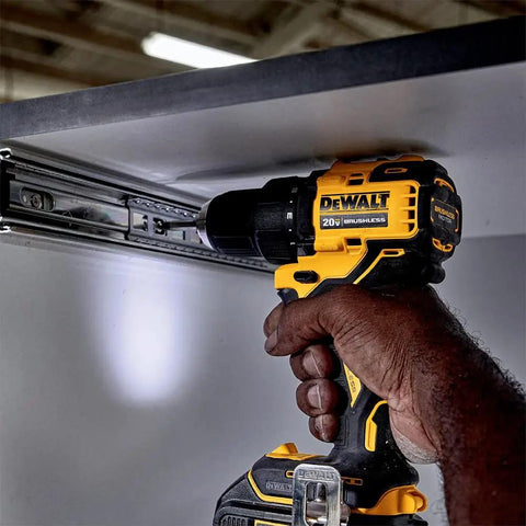 Compact 20V Cordless Drill And Driver Kit With Brushless Motor Half Inch Chuck Ultra Lightweight At Two Point Four Pounds Handy For Tight Spaces being used under cabinet.