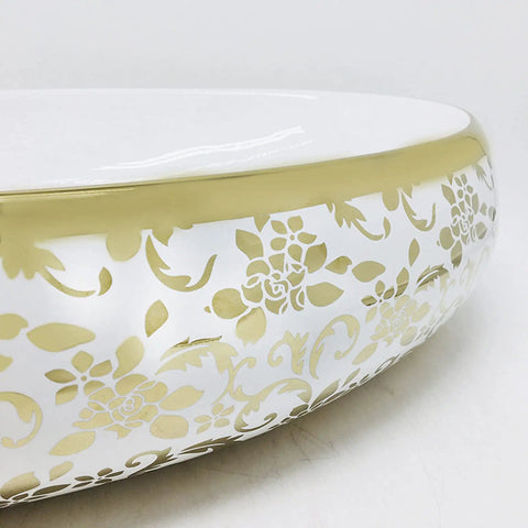 Real Deal Oval Vessel Sink, Solid Ceramic Bathroom Basin With Sleek Gold Finish, intricate floral design detail on the side.