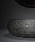 SDVantage Black Ceramic Bathroom Vessel Sink and Faucet Combo, close-up of textured wash basin design.