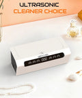 Ultrasonic Jewelry Cleaner 45KHz Machine with digital touch control, shown on a countertop surrounded by jewelry and toiletries.