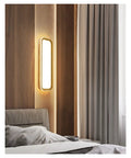 Slick Modern Wall Sconces With Smooth Remote Dimming For Real Cozy Living Rooms And Bedrooms. Rust proof metal and acrylic wall sconce.
