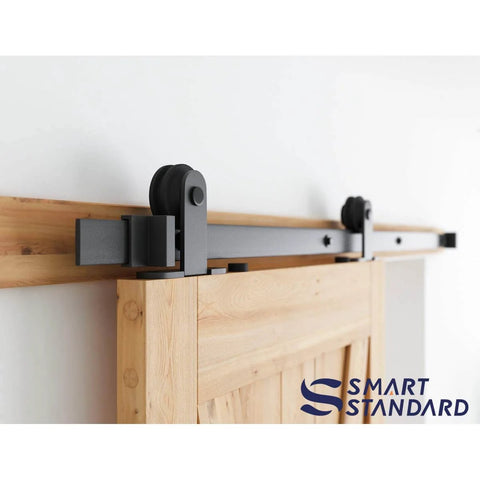 5 Foot Top Mount Sliding Barn Door Hardware Kit With Pull Handle And Floor Guide Fits 30 Inch Wide Door Panel T Shape Hanger DIY Friendly Easy To Install Premium Quality, showing close-up of door mounted on rail with T shape hanger in use.