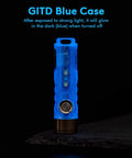 Glow-in-the-dark blue Aurora A7 G4 7075 USB C Rechargeable Keychain Flashlight 650 High Lumens Tiny Yet Mighty EDC Light on a surface.