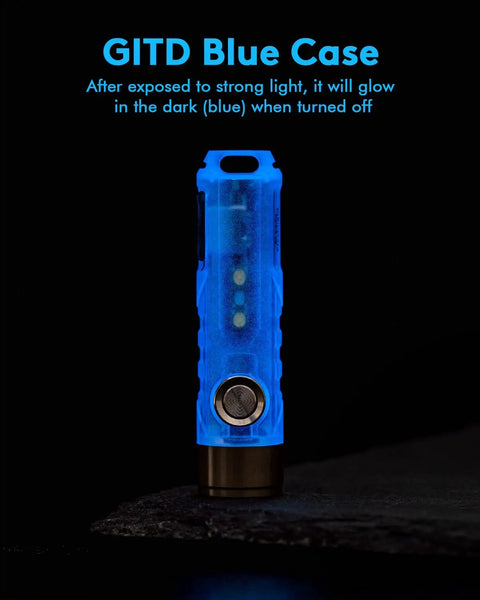 Glow-in-the-dark blue Aurora A7 G4 7075 USB C Rechargeable Keychain Flashlight 650 High Lumens Tiny Yet Mighty EDC Light on a surface.