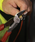 Person using USA Made Wire Cutter, Stripper, and Crimp Tool With Shear Cutter, A Real Workhorse For Stripping 10-18 AWG wire.