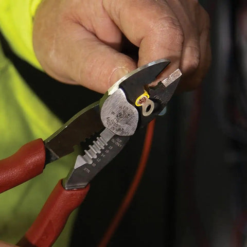 Person using USA Made Wire Cutter, Stripper, and Crimp Tool With Shear Cutter, A Real Workhorse For Stripping 10-18 AWG wire.