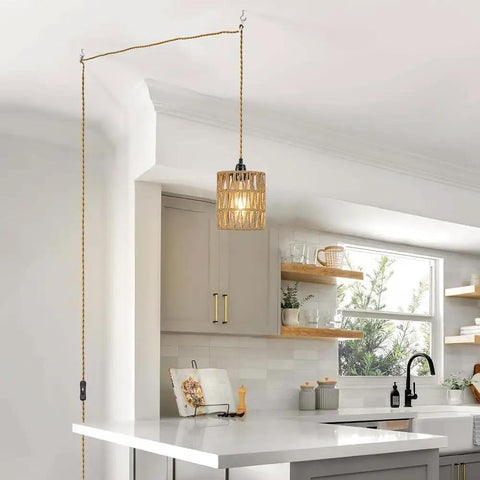 Straight Up Chic Boho Woven Rattan Plug In Pendant Ceiling Light Casting Dreamy Art Deco Wall Shadows And Bringing Super Chill Vibes To Every Cozy Room Today, in a modern kitchen with a visible 15 ft cord.