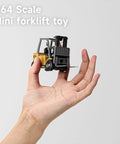 Hand holding One Sixty Fourth Scale Alloy RC Forklift Toy With Lights And Sounds Two Point Four Gigahertz Remote Control Truck