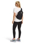 Woman wearing Isabella Sling Crossbody Bag For Women With Large Main Compartment, Water-Repellent Finish, Adjustable Strap