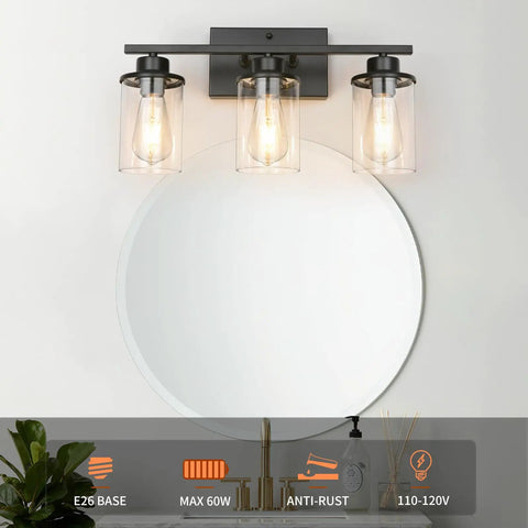 Slick Black 3 Light Vanity Light Fixtures Over Mirror With Clear Glass Shades in modern bathroom setting