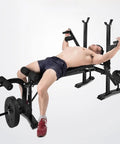 Person using 4 In 1 Weight Bench Set With Preacher Curl Pad And Leg Developer For Home Gym Full Body Training Adjustable Standard Bench