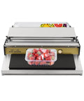 Rock Solid No Sweat Hand Cling Wrap Sealer And 18 Inch Food Packaging Machine with strawberries packaged in a plastic container.