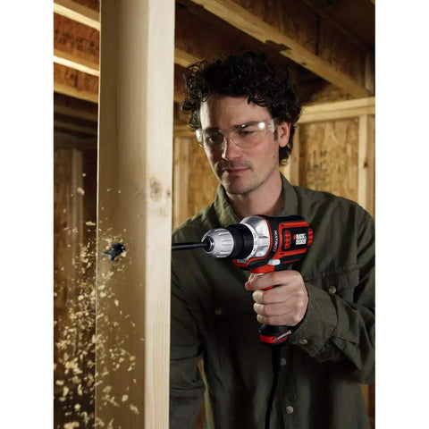 Man using Matrix Quick Connect System Drill Driver With Tool Free Attachments Powerful 4 Amp Corded Drill in woodwork project