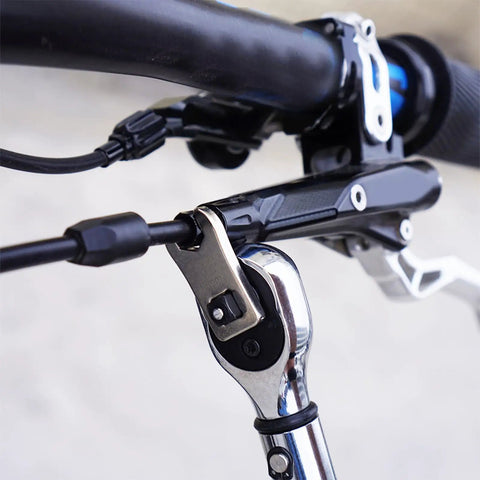 Totally Dead Nuts Precise 8mm Cycling Disc Brake Wrench And Cable Adjuster Tool Hella Reliable Hexagon Design for precise cable adjustment on a bike handlebar.
