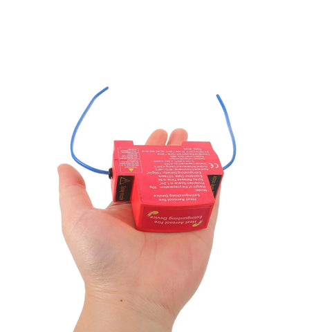 Straight Up Automatic Car Fire Extinguisher With Adhesive Mount For Rv Marine And Pickup Trucks held in hand showing compact size and design.
