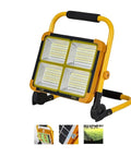 JUDYSSY 1000W Solar Flood Light Portable Led Reflector Spotlight Rechargeable Projector Floodlight device with yellow frame.