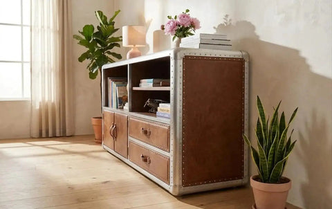 Knockout Aviator Sideboard Cabinet Drops That Aero Industrial Heat With Wraparound Weathered Brown Leather Riveted Silver Trim And Massive Storage Building A Solid 54 Inch Credenza Console Table For Any Cool Living Space, featuring shelves and drawers.