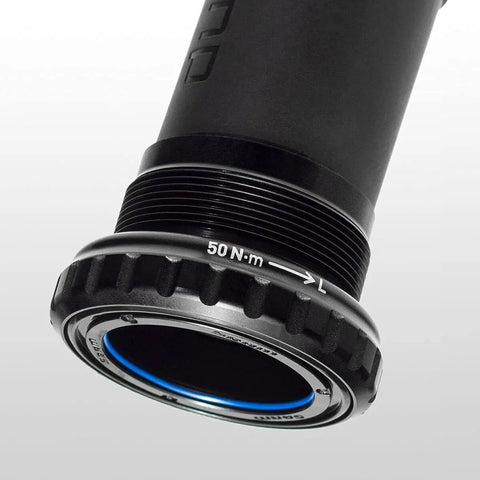 Close-up of DUB English Bottom Bracket Sealed Cartridge Bearings Threaded BSA 68 And 73mm Black With Gutter Seal Technology