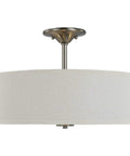 Inspire Close To Ceiling Nickel Flush Mount Light Fixture, 11.5x18x18, minimalist design with linen shade and nickel finish.